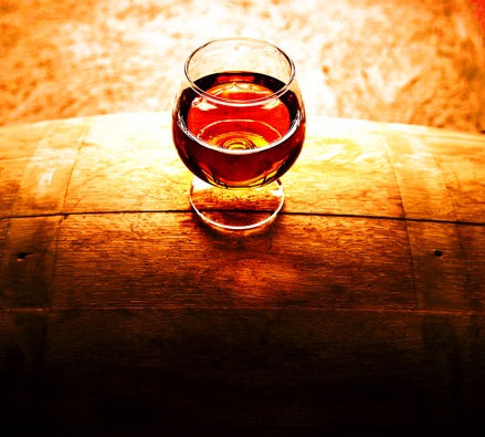 Bourbon snifter on a barrel